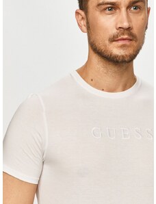Памучна тениска Guess в бяло с апликация