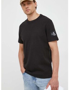Памучна тениска Calvin Klein Jeans в черно с апликация J30J323489