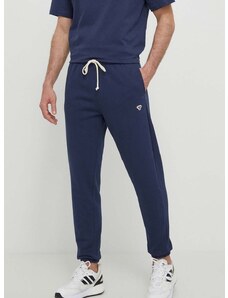 Спортен панталон Hummel в синьо с изчистен дизайн