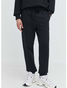 Памучен спортен панталон Herschel в черно с изчистен дизайн