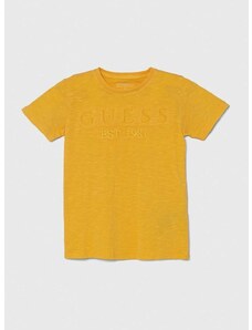 Детска памучна тениска Guess в жълто с апликация