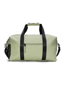 RAINS Пътна чанта пастелно зелено / черно