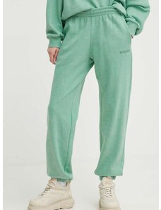 Памучен спортен панталон Rotate в зелено с изчистен дизайн