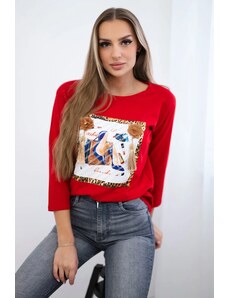 Kesi Blouse with 3D graphics and decorative pom pom red