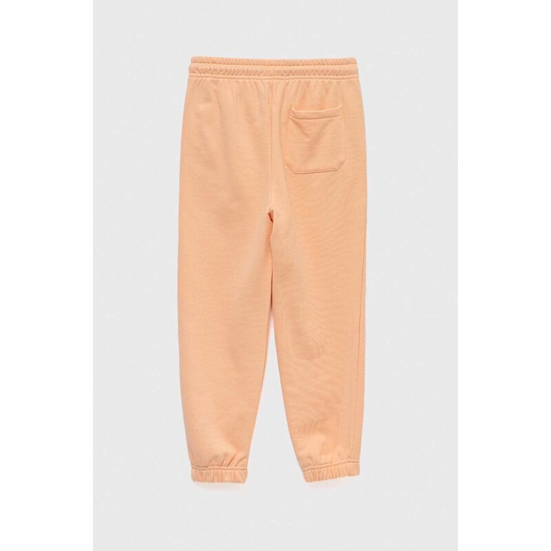 Детски спортен панталон Calvin Klein Jeans в оранжево с изчистен дизайн