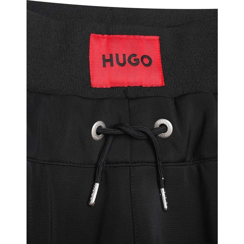 Детски спортен панталон HUGO в черно с апликация