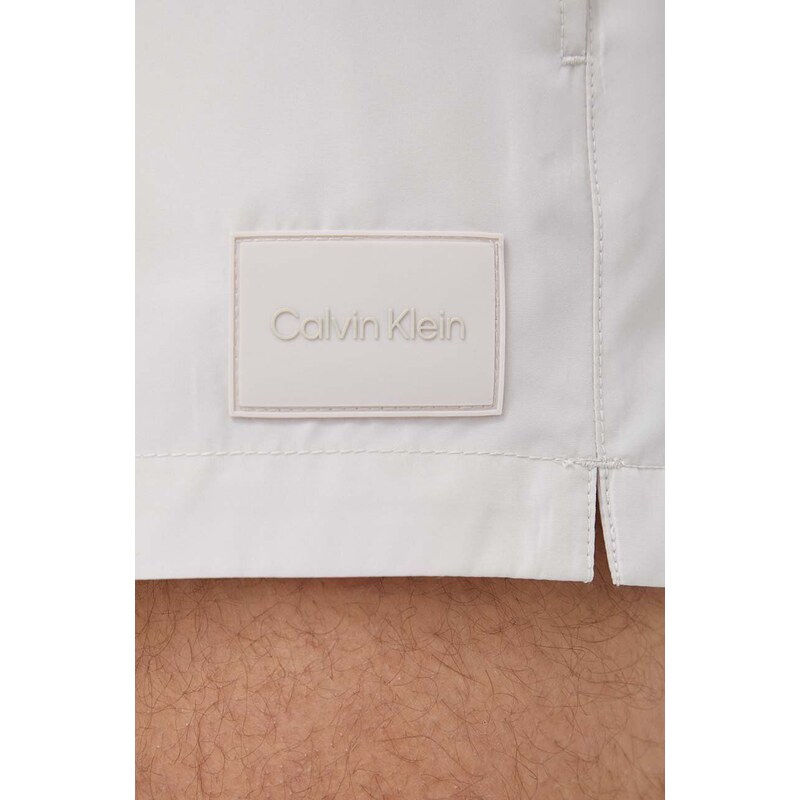 Плувни шорти Calvin Klein в бежово KM0KM00920