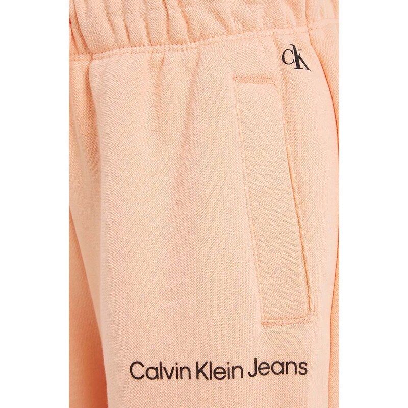 Детски спортен панталон Calvin Klein Jeans в оранжево с изчистен дизайн