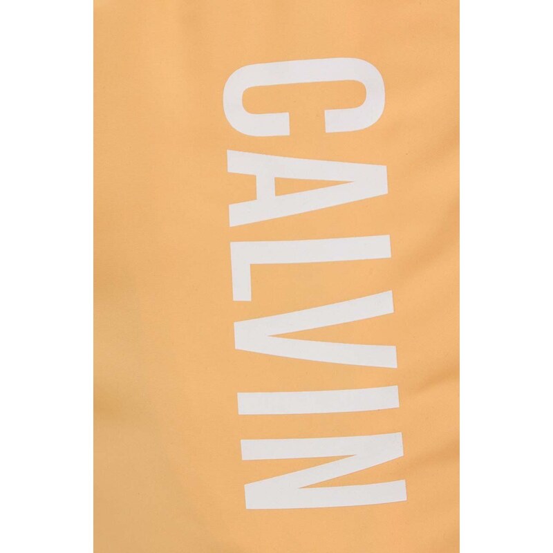 Плувни шорти Calvin Klein в оранжево KM0KM01004