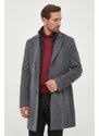 Вълнено палто BOSS в сиво преходен модел